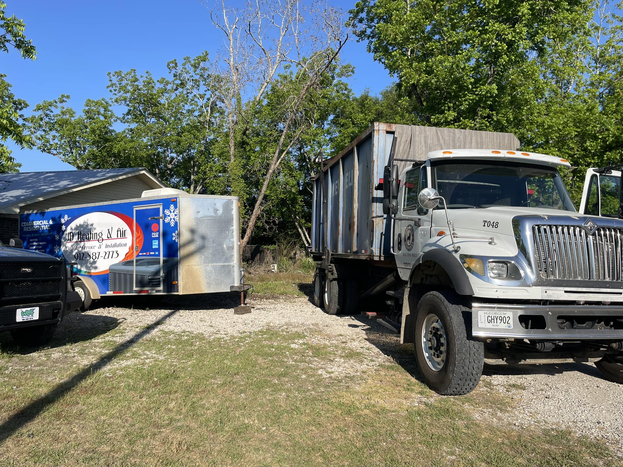 Dogwood Disposal roll-off dumpster on Metter Georgia residential driveway delivery