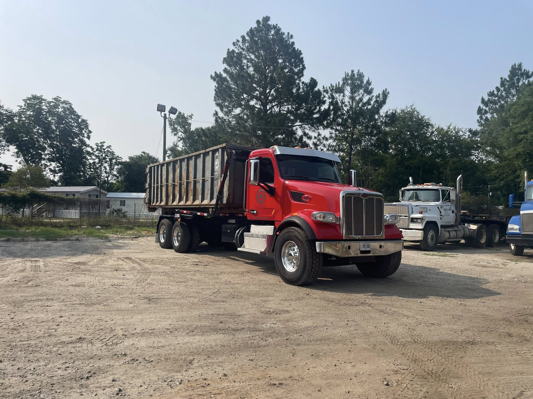 Dogwood Disposal 20 yard dumpster ready for pickup in Metter Candler County